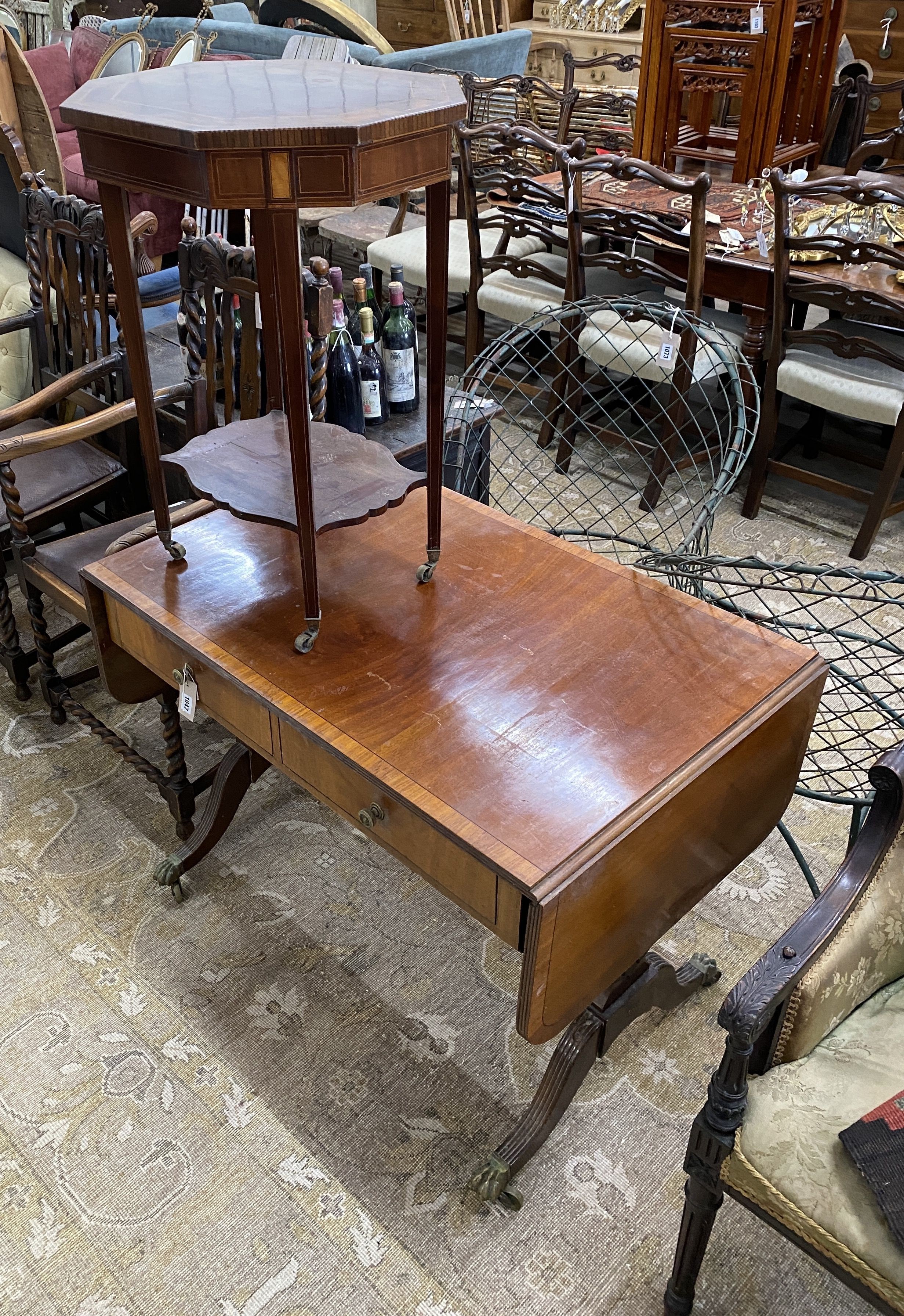 A Regency style banded mahogany sofa table together with an Edwardian octagonal mahogany centre table, larger width 98cm, depth 61cm, height 74cm